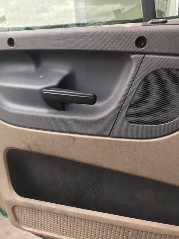 Door panel before the interior detail, dusty and stained